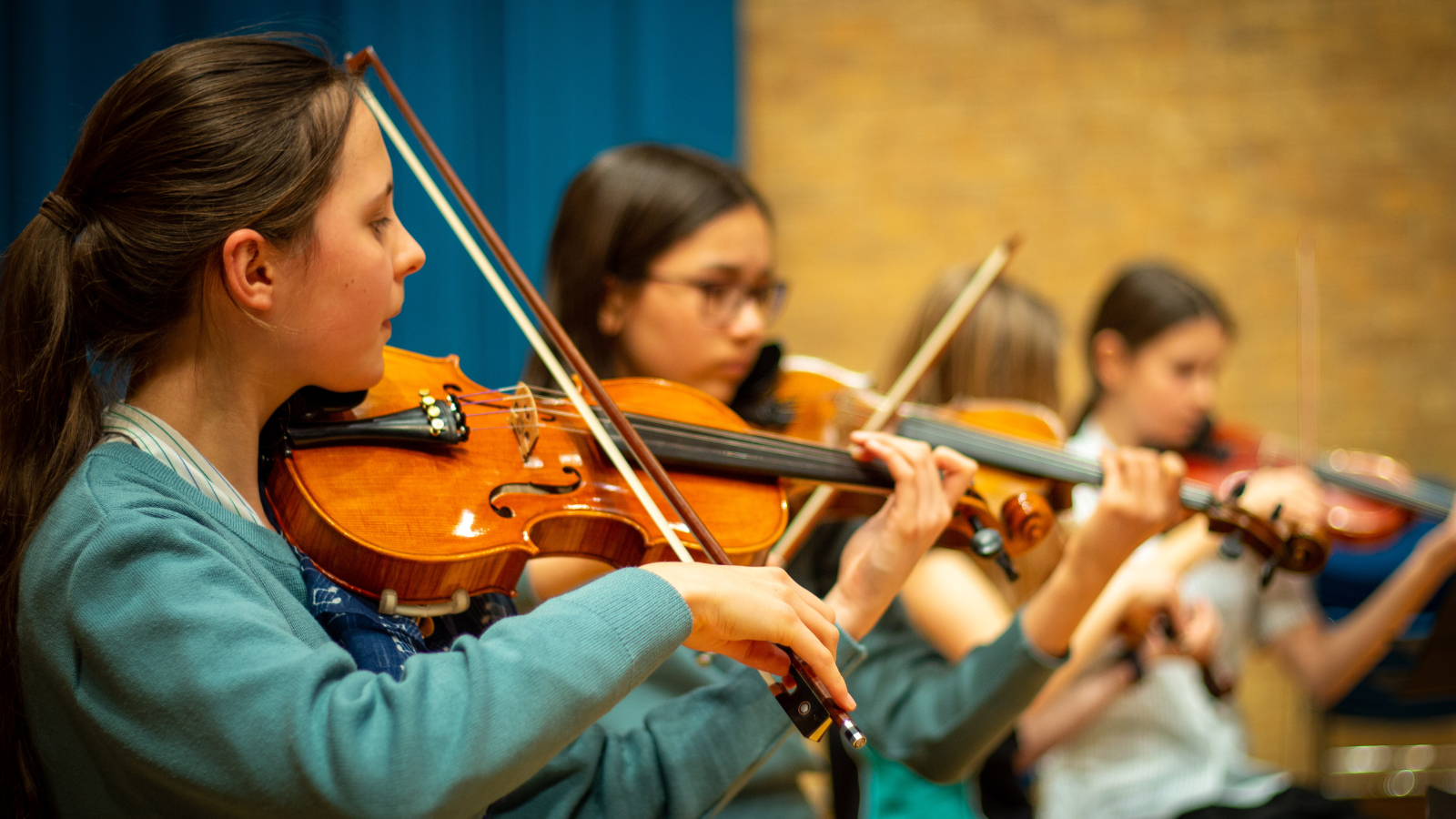 Students playing the violin