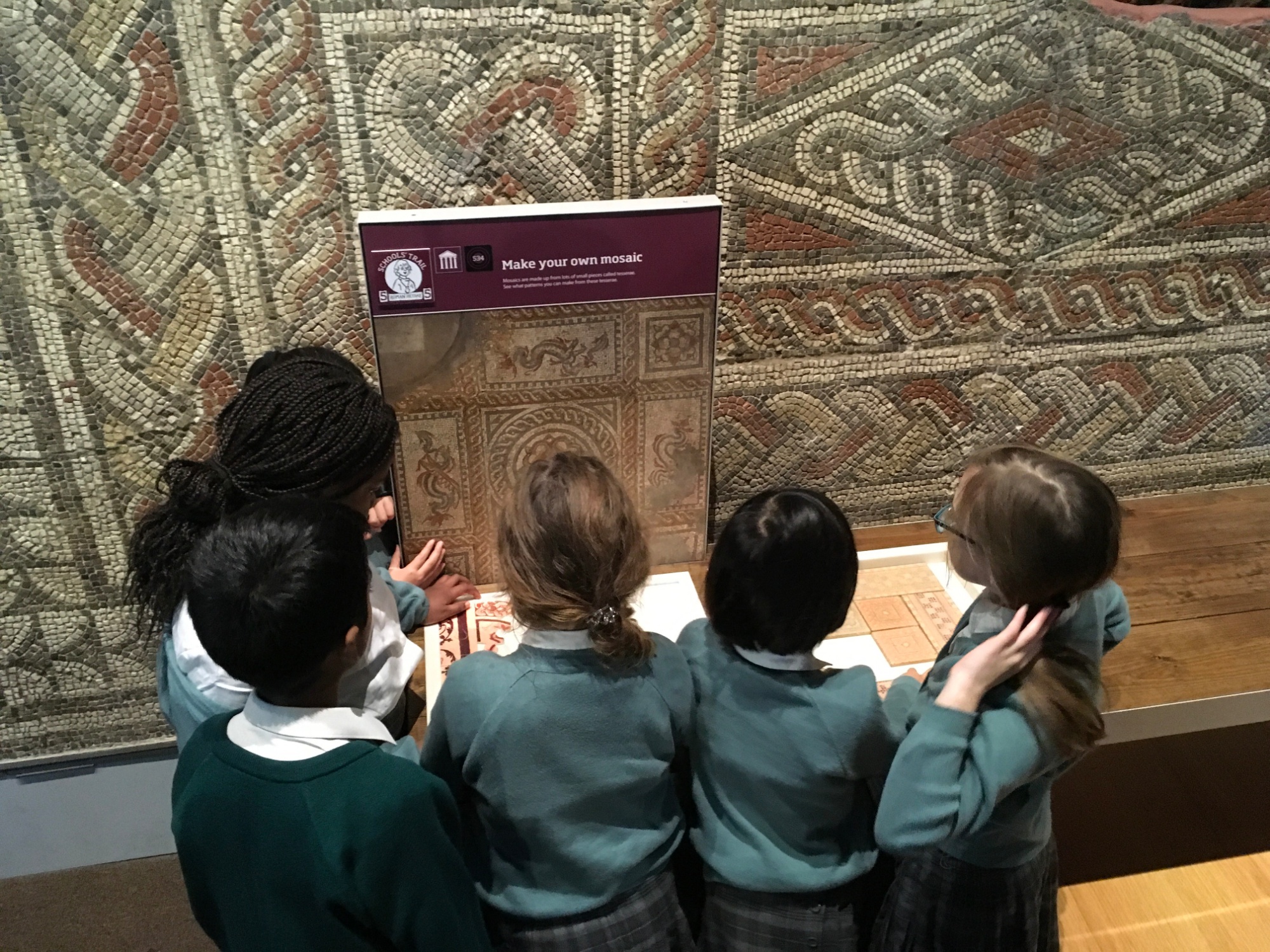 Year 4 pupils make their own mosaic