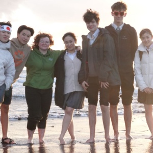Stephen Perse and Keio students on the beach in Japan as part of the exchange programme